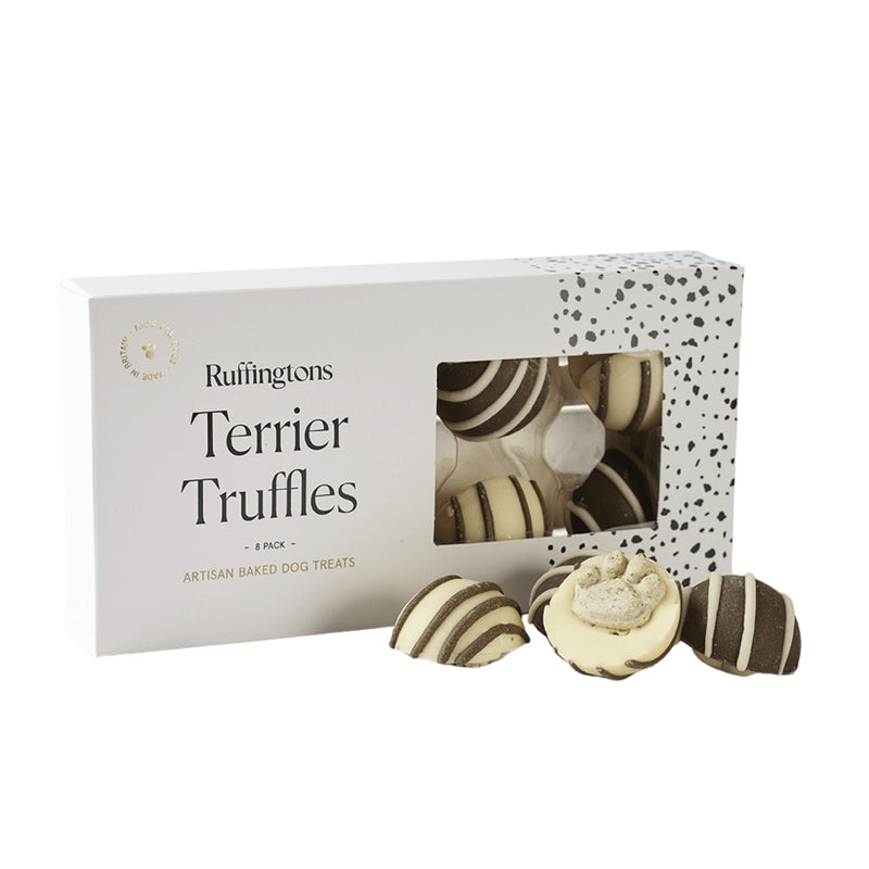 Load image into Gallery viewer, Ruffingtons Terrier Truffles 8‑pack – carob and yoghurt-coated dog treats with paw and bone decorations