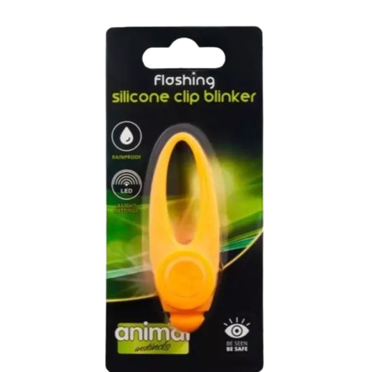 Animal Instincts Flashing Silicone Clip Blinker attached to a dog collar, waterproof LED safety light for nighttime walks