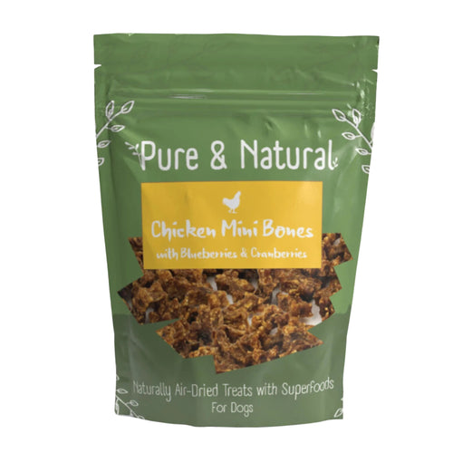 Pure & Natural Chicken Mini Bones – high-protein, grain-free dog treats with blueberries and cranberries for added health benefits.